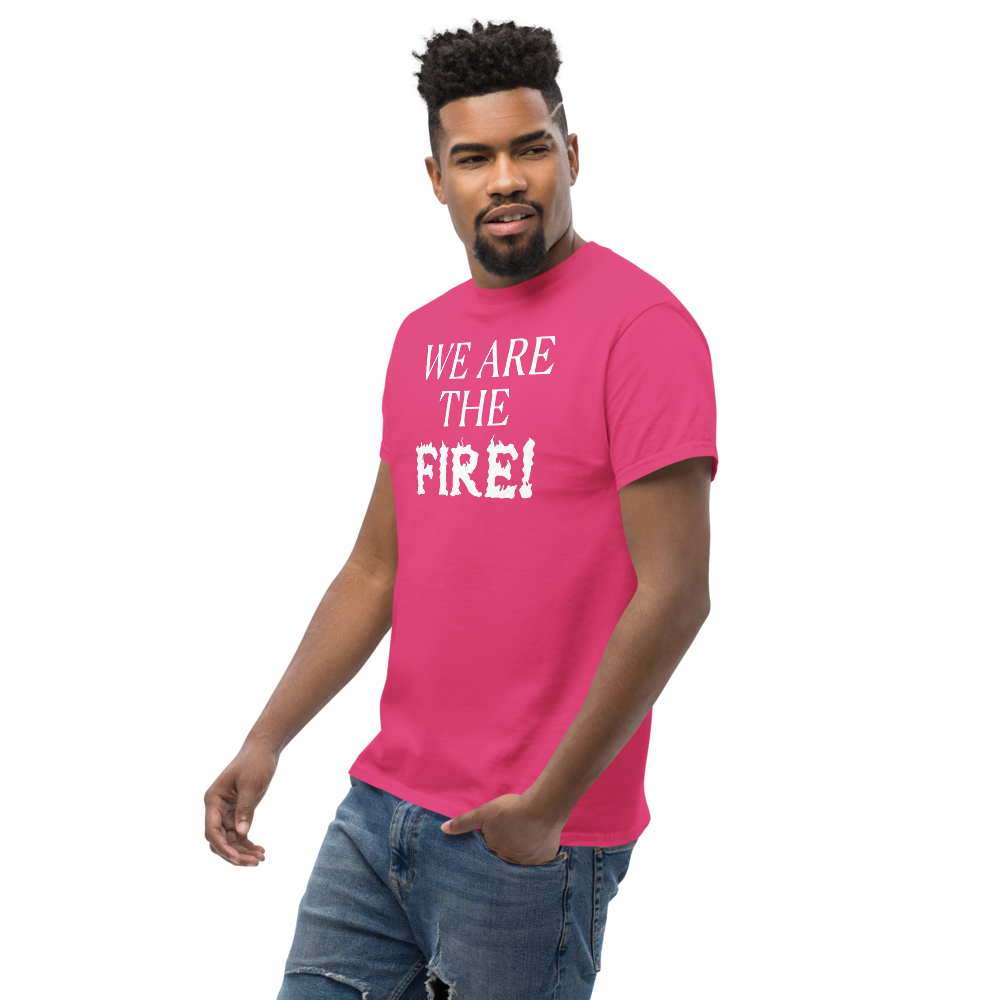 "We are the fire!" printed on a heliconia unisex classic tee worn by a male
