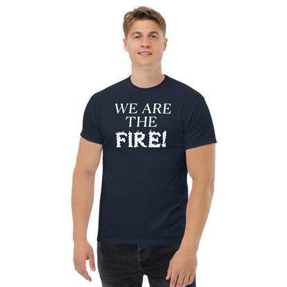 "We are the fire!" printed on a navy unisex classic tee worn by a male