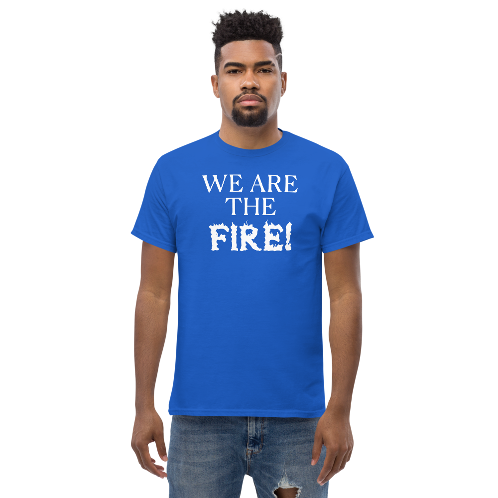 "We are the fire!" printed on a royal unisex classic tee worn by a male