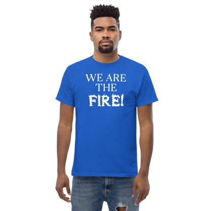 "We are the fire!" printed on a royal unisex classic tee worn by a male