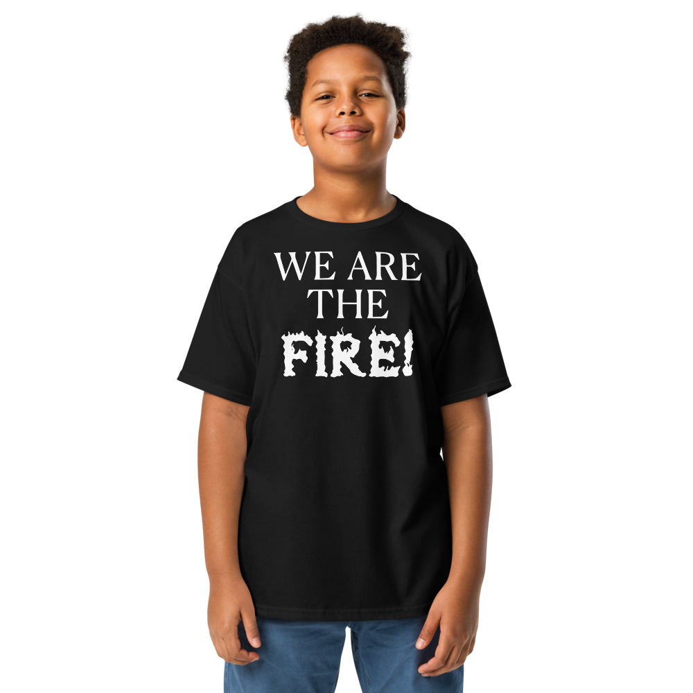 "We are the fire!" printed on a black youth classic tee worn by a male