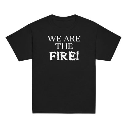 "We are the fire!" printed on a black youth classic tee laying on a flat surface