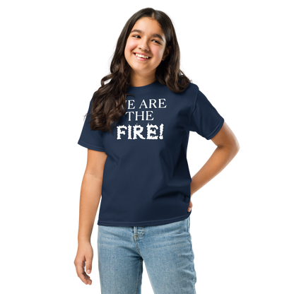 "We are the fire!" printed on a navy youth classic tee worn by a female
