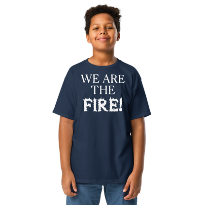 "We are the fire!" printed on a navy youth classic tee worn by a male