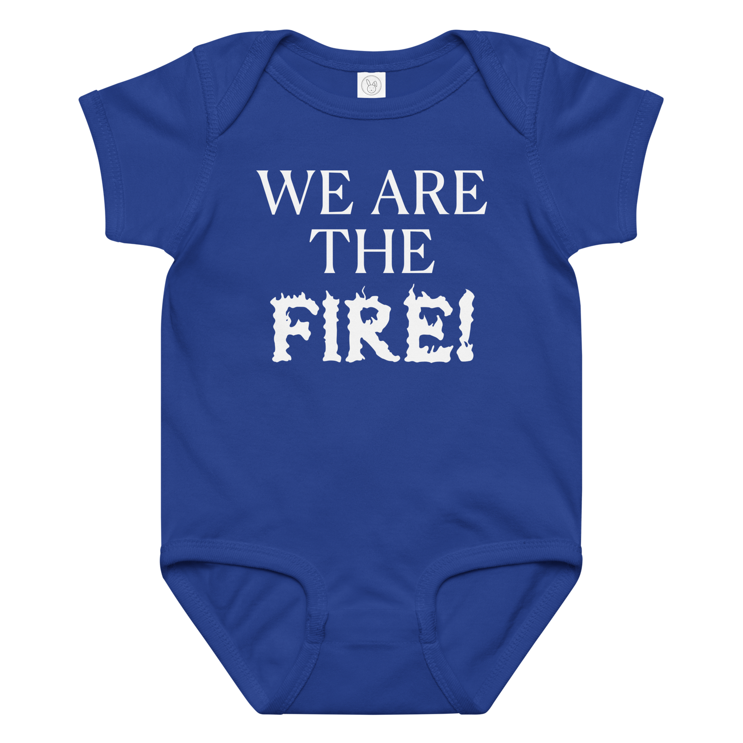 "We are the fire!" printed on a royal baby jersey bodysuit laying on a flat surface amongst other clothes