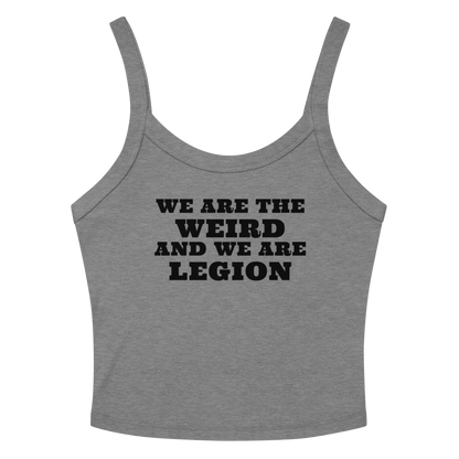 "We are the weird and we are legion" printed on a athletic heather women's micro-rib tanktop laying on a flat surface amongst sunglasses and shorts