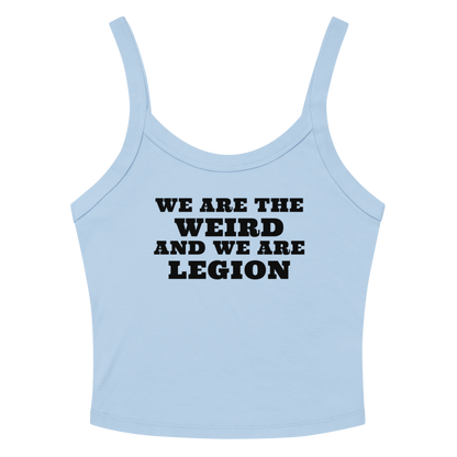 "We are the weird and we are legion" printed on a solid baby blue blend women's micro-rib tanktop laying on a flat surface amongst sunglasses and shorts