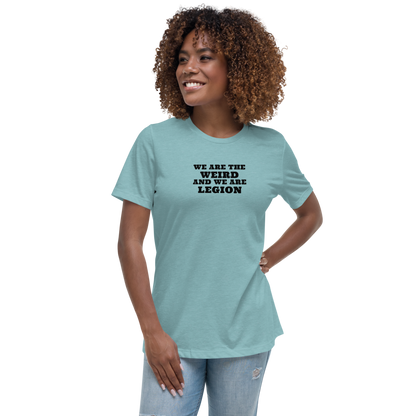 "We are the weird and we are legion" printed on a heather blue lagoon women's relaxed t-shirt worn by a female