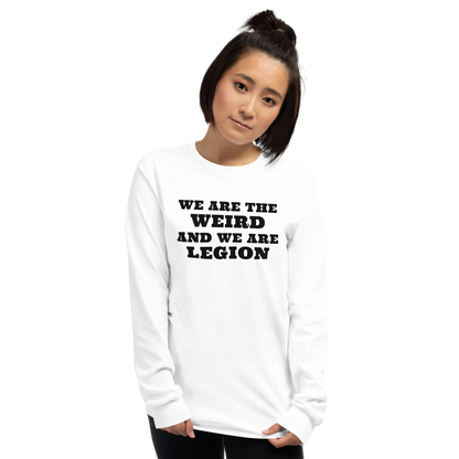 "We are the weird and we are legion" printed on a white men's long sleeve shirt worn by a female