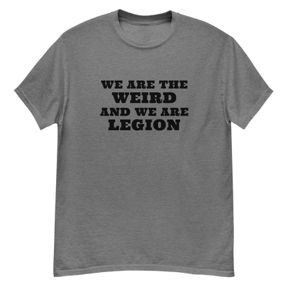 "We are the weird and we are legion" printed on a graphite heather unisex classic tee laying on a flat surface