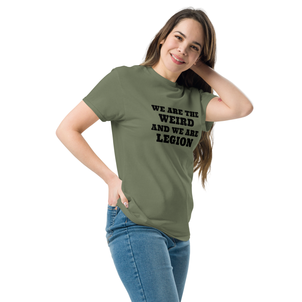 "We are the weird and we are legion" printed on a military green unisex classic tee worn by a female
