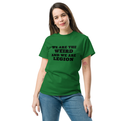 "We are the weird and we are legion" printed on a turf green unisex classic tee worn by a female