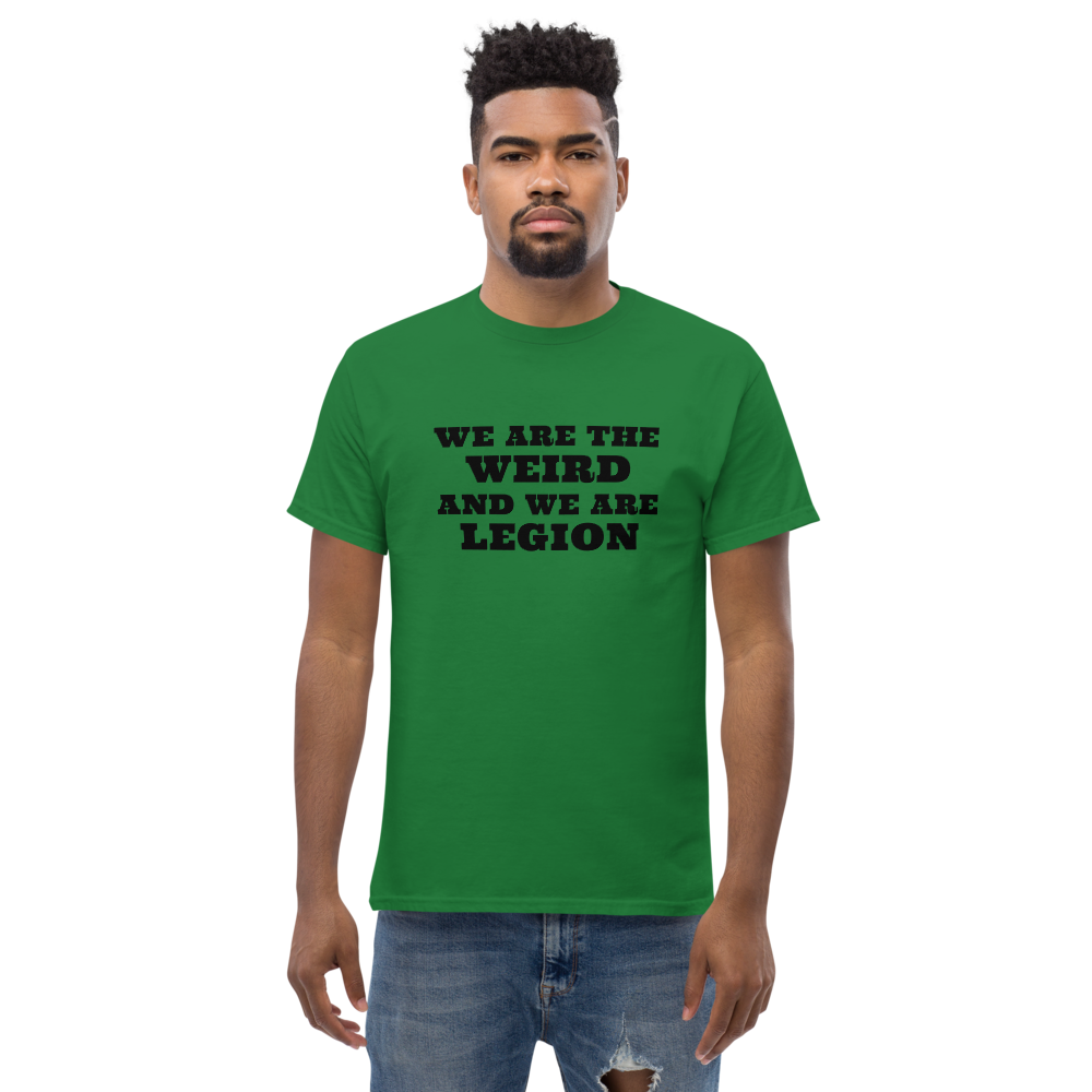 "We are the weird and we are legion" printed on a turf green unisex classic tee worn by a male