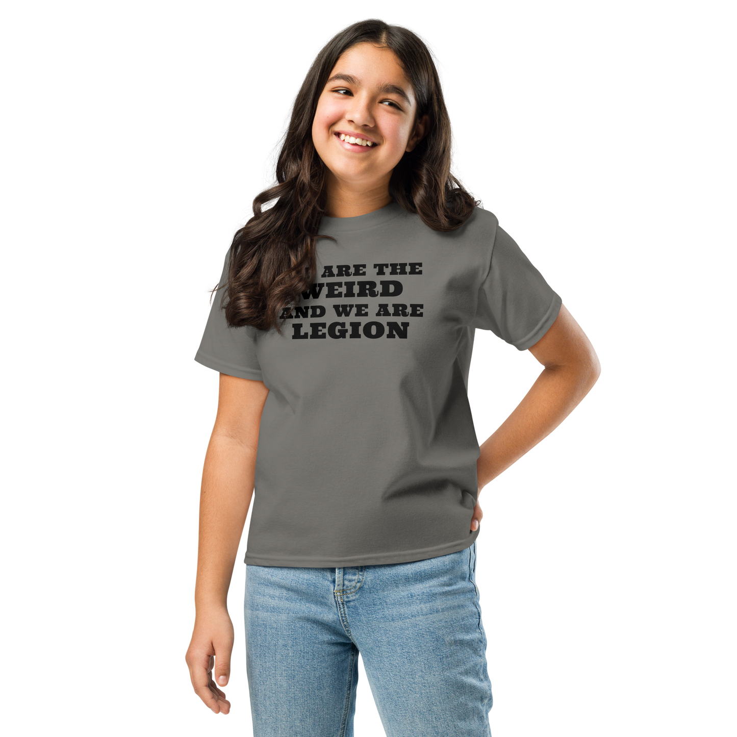 "We are the weird and we are legion" printed on a charcoal youth classic tee worn by a female