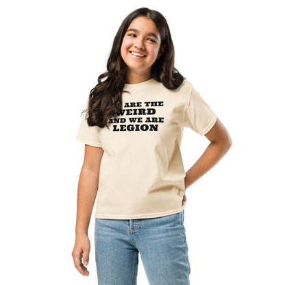 "We are the weird and we are legion" printed on a natural youth classic tee worn by a female