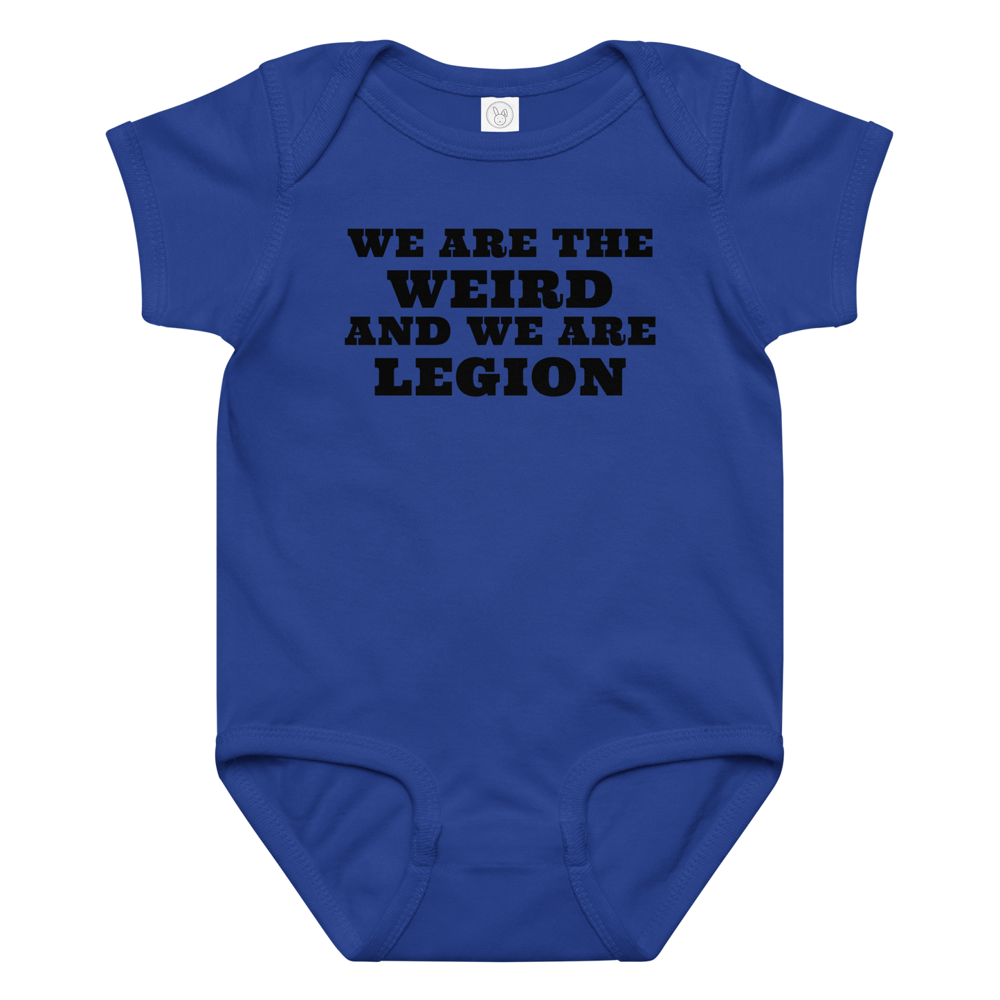 "We are the weird and we are legion" printed on a royal baby jersey bodysuit laying on a flat surface amongst other clothes