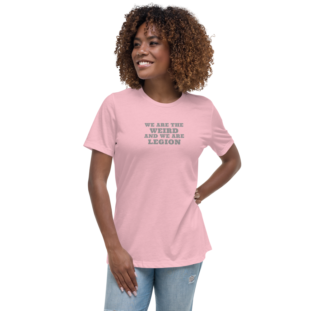 "We are the weird and we are legion" printed on a pink women's relaxed t-shirt worn by a female