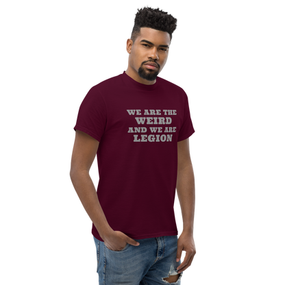 "We are the weird and we are legion" printed on a maroon unisex classic tee worn by a male
