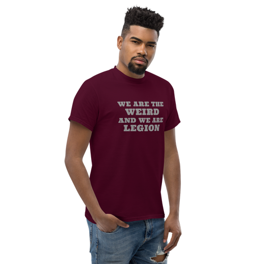 "We are the weird and we are legion" printed on a maroon unisex classic tee worn by a male