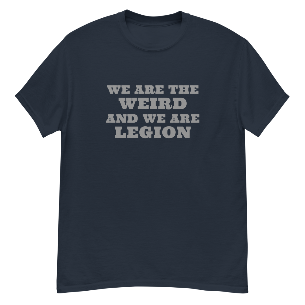"We are the weird and we are legion" printed on a navy unisex classic tee laying on a flat surface