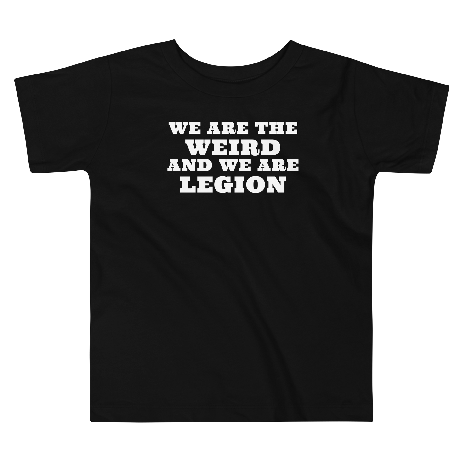 "We are the weird and we are legion" printed on a black toddler short sleeve tee laying on a flat surface