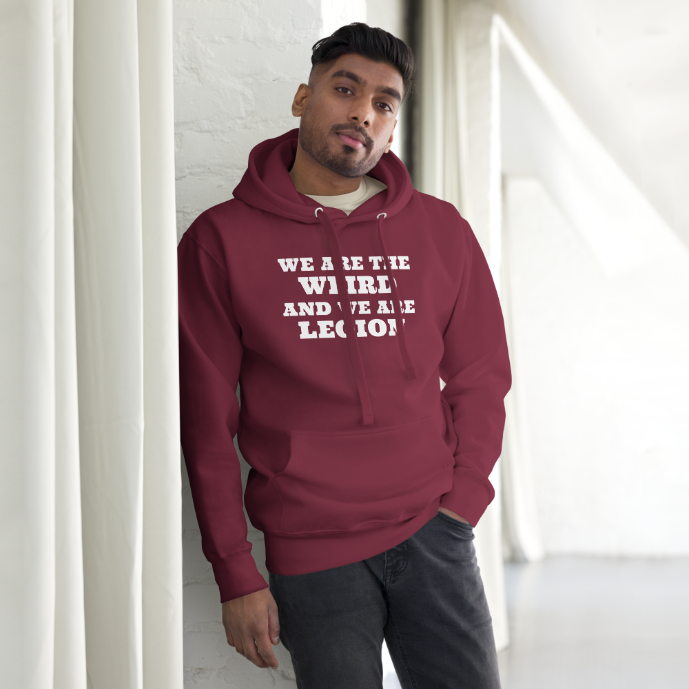 "We are the weird and we are legion" printed on a maroon unisex hoodie worn by a male