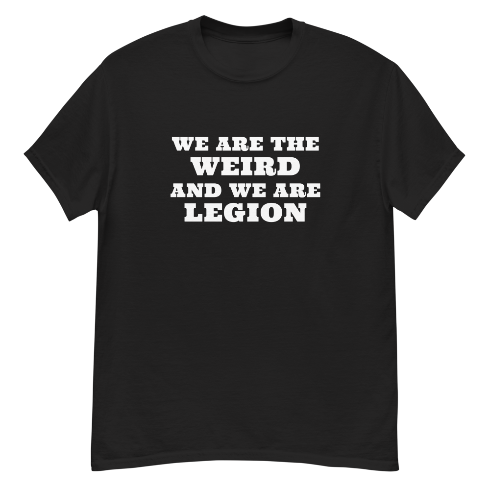 "We are the weird and we are legion" printed on a black unisex classic tee laying on a flat surface