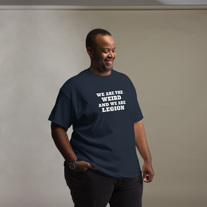 "We are the weird and we are legion" printed on a navy unisex classic tee worn by a male