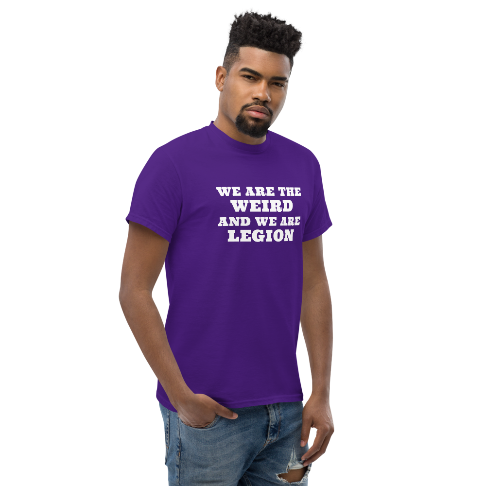 "We are the weird and we are legion" printed on a purple unisex classic tee worn by a male
