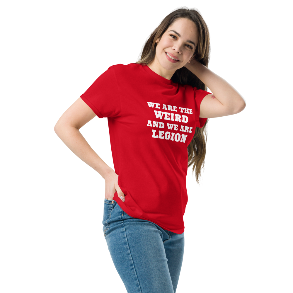 "We are the weird and we are legion" printed on a red unisex classic tee worn by a female