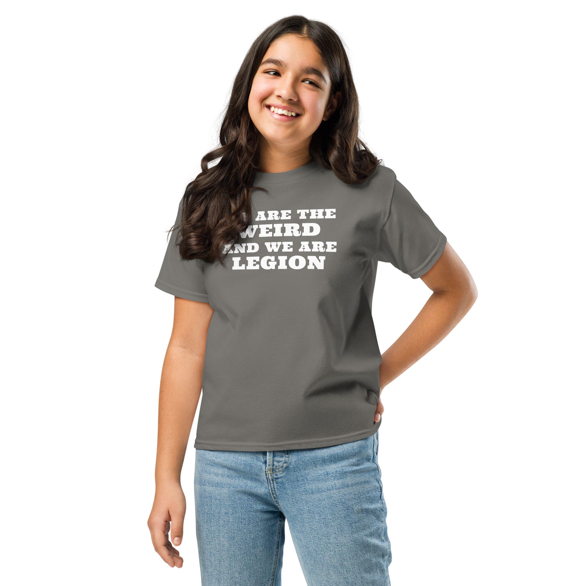 "We are the weird and we are legion" printed on a charcoal youth classic tee worn by a female
