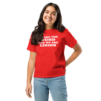 "We are the weird and we are legion" printed on a red youth classic tee worn by a female