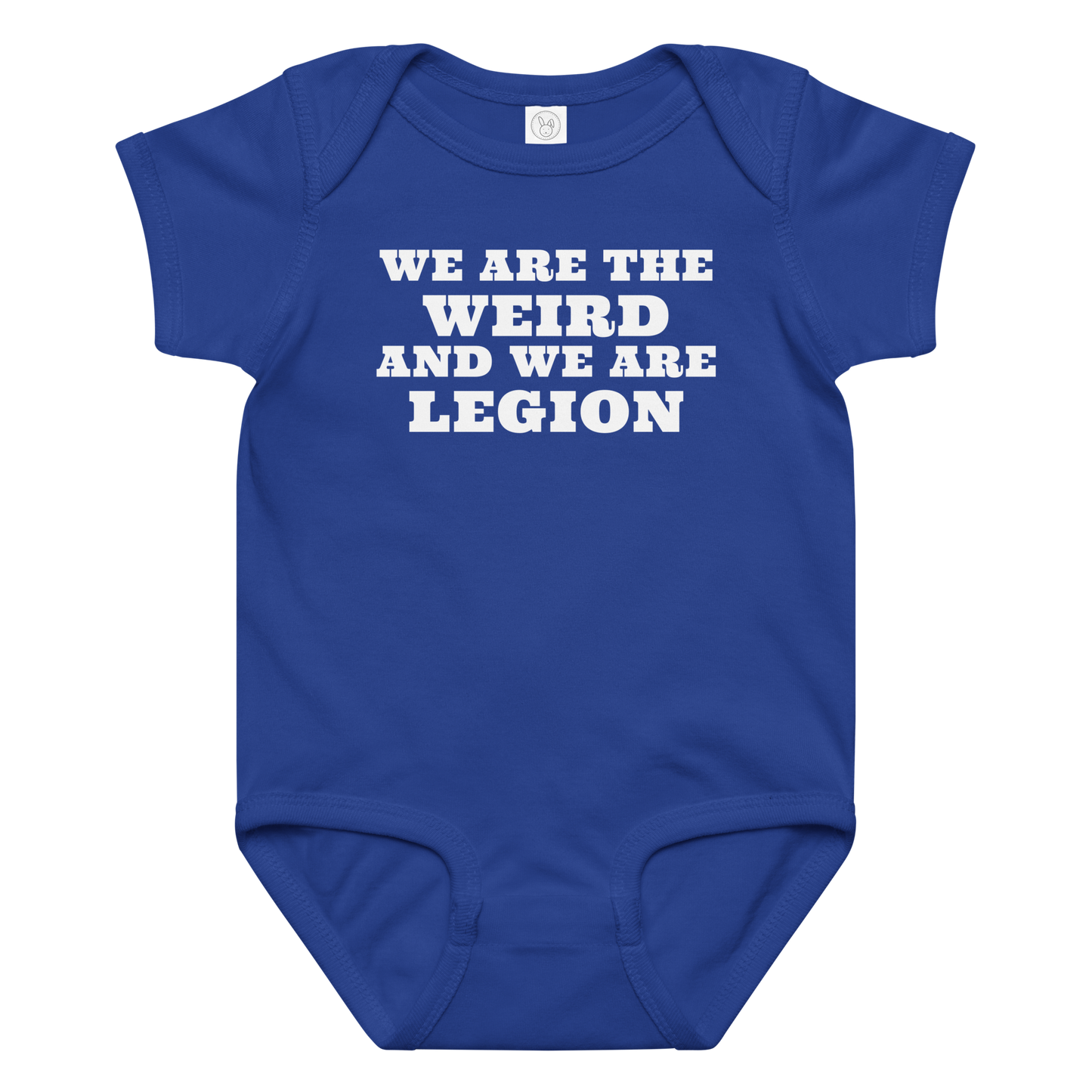 "We are the weird and we are legion" printed on a royal baby jersey bodysuit laying on a flat surface amongst other clothes