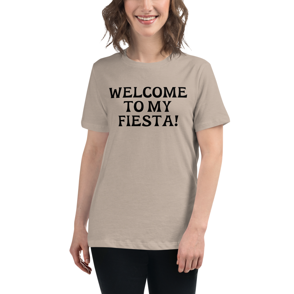 "Welcome to my fiesta!" printed on a heather stone women's relaxed t-shirt worn by a female