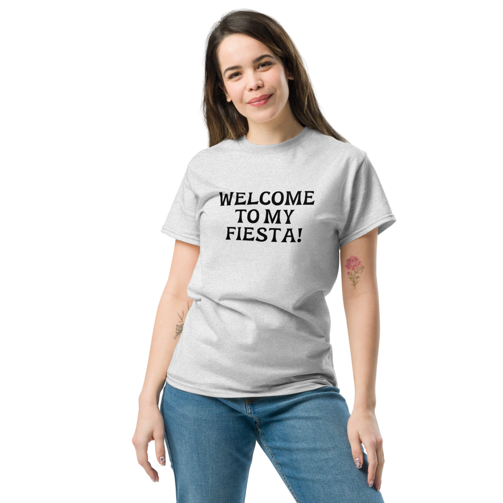 "Welcome to my fiesta!" printed on a ash unisex classic tee worn by a female