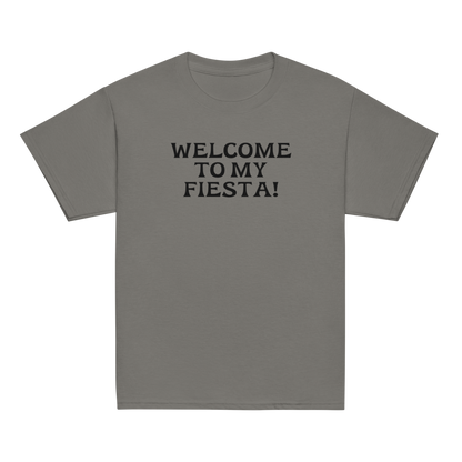"Welcome to my fiesta!" printed on a charcoal youth classic tee laying on a flat surface