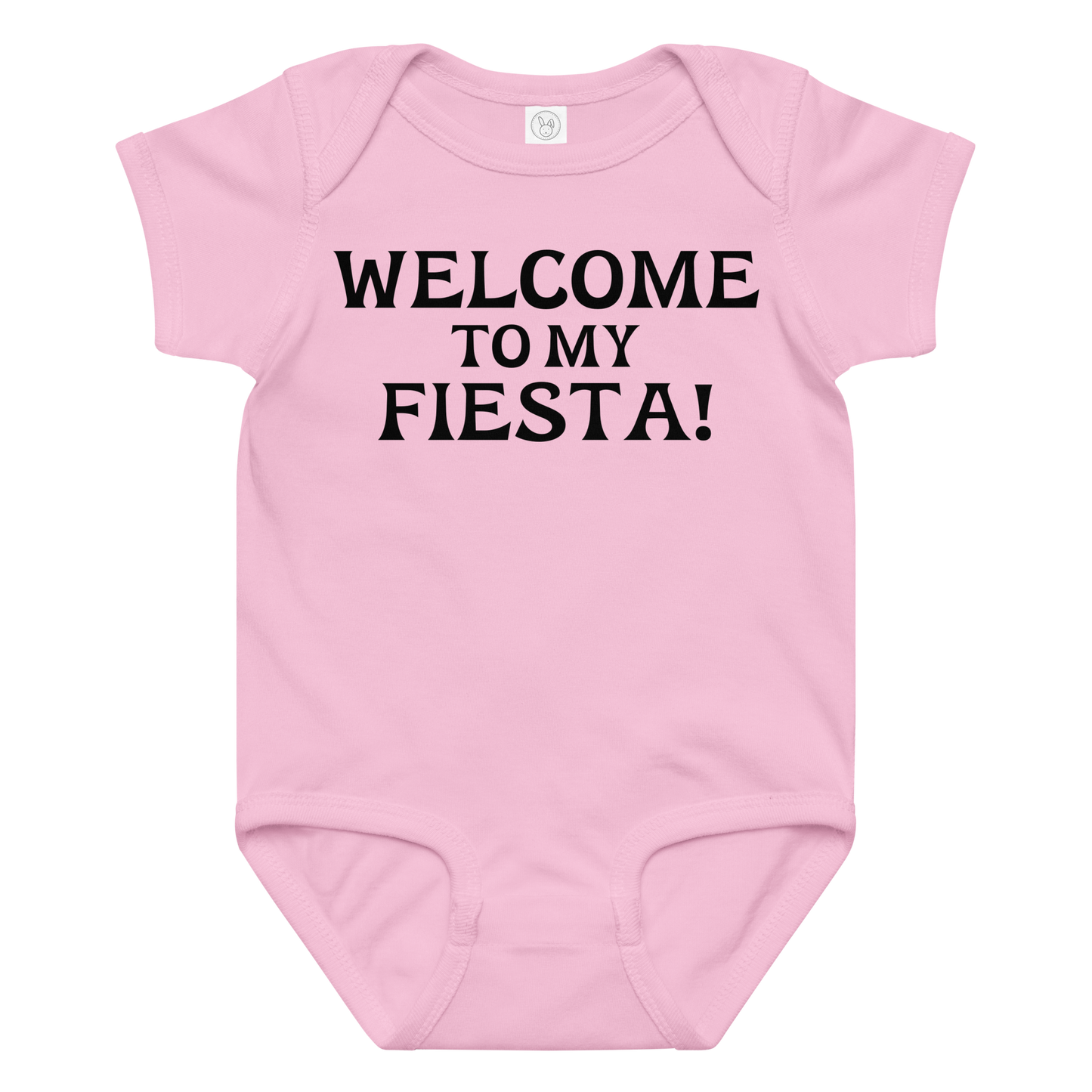 "Welcome to my fiesta!" printed on a pink baby jersey bodysuit laying on a flat surface amongst other clothes