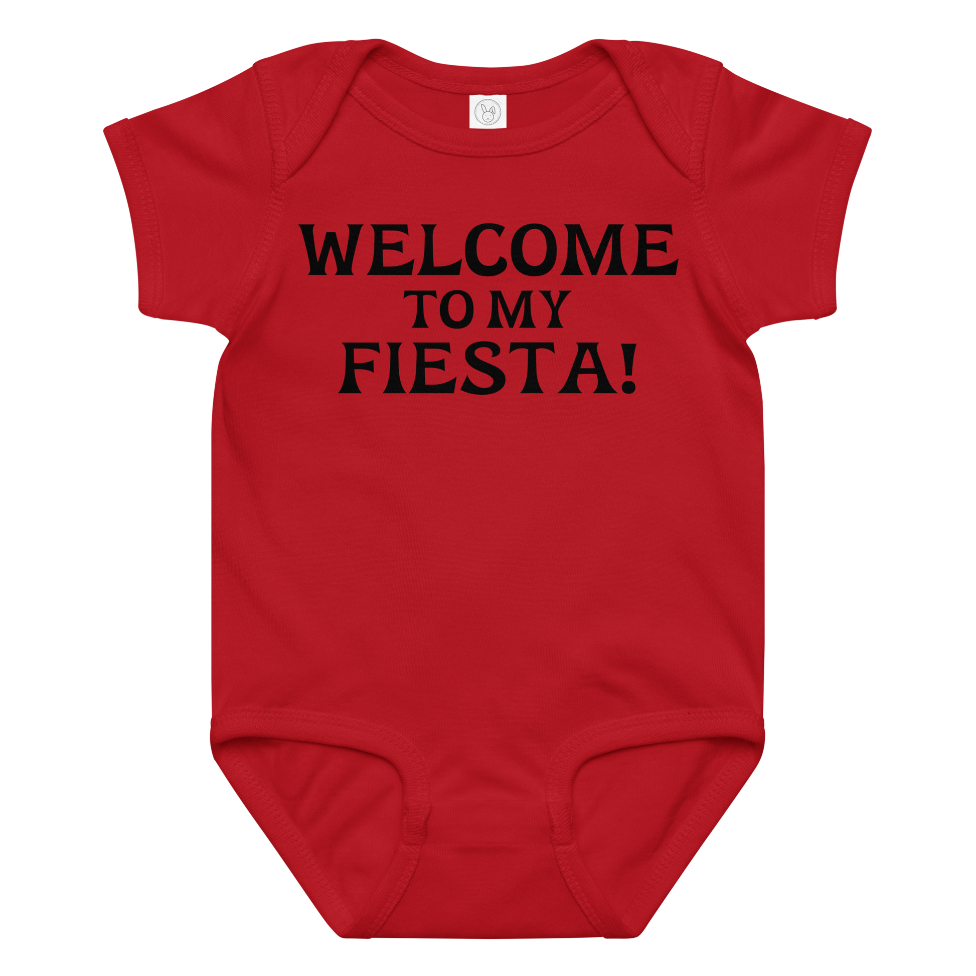 "Welcome to my fiesta!" printed on a red baby jersey bodysuit laying on a flat surface amongst other clothes