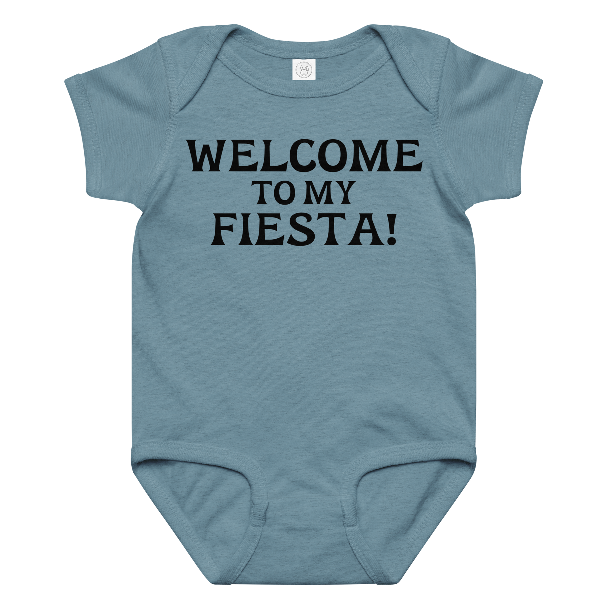 "Welcome to my fiesta!" printed on a vintage indigo baby jersey bodysuit laying on a flat surface amongst other clothes
