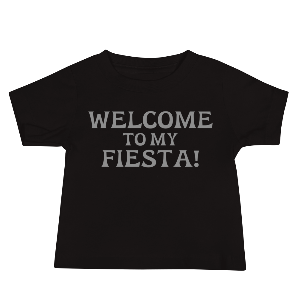 "Welcome to my fiesta!" printed on a black baby jersey short sleeve tee laying on a flat surface