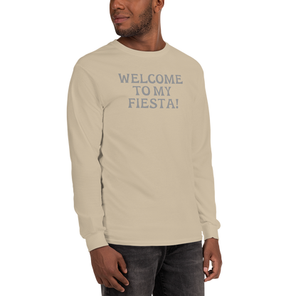 "Welcome to my fiesta!" printed on a sand men's long sleeve shirt worn by a male
