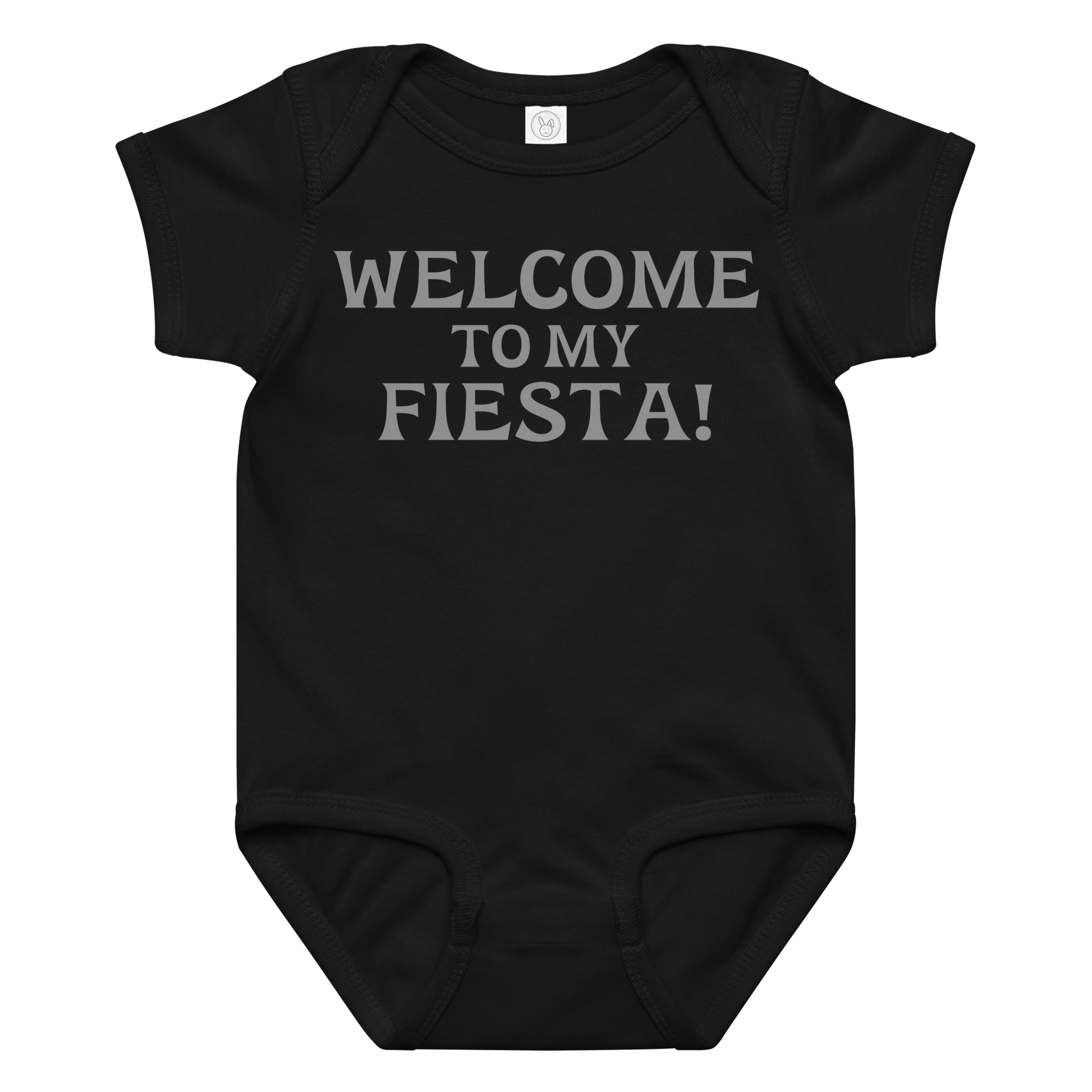 "Welcome to my fiesta!" printed on a black baby jersey bodysuit laying on a flat surface amongst other clothes