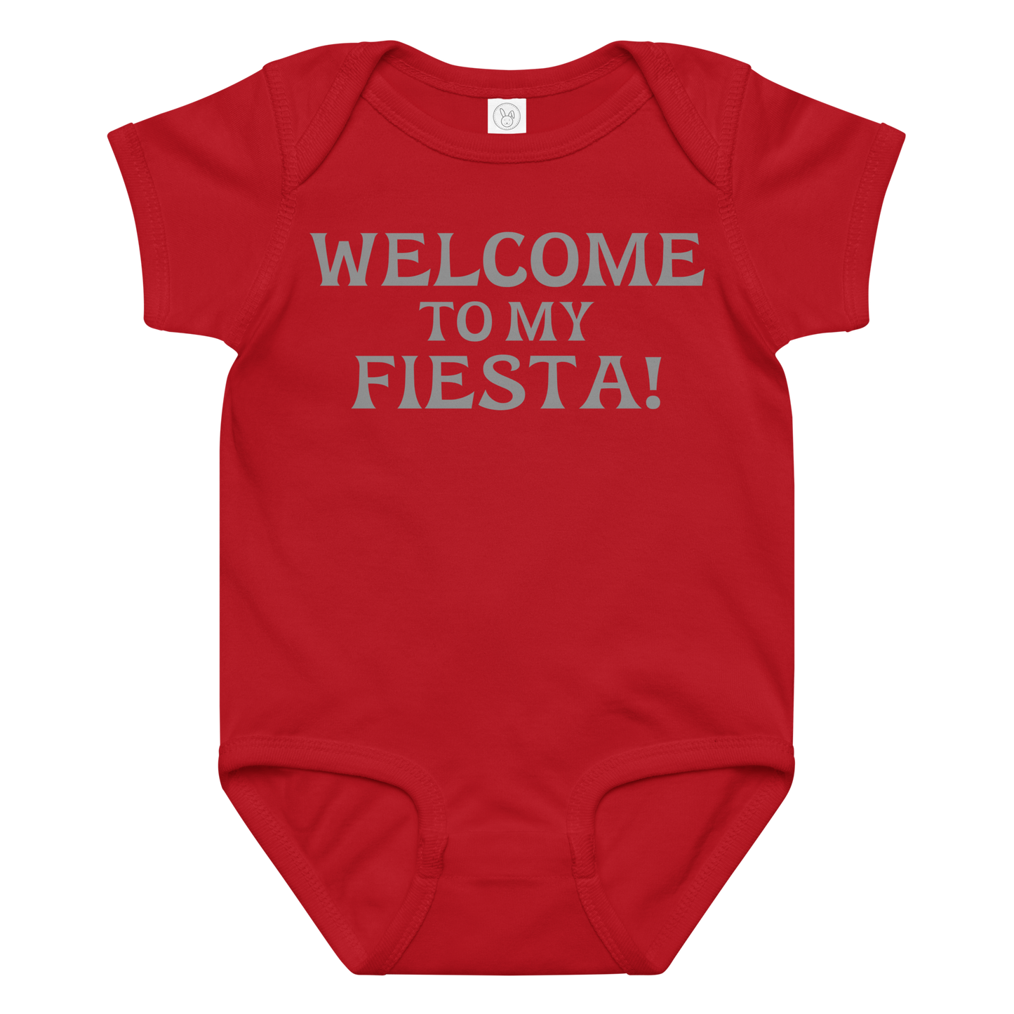 "Welcome to my fiesta!" printed on a red baby jersey bodysuit laying on a flat surface amongst other clothes