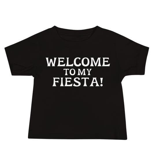"Welcome to my fiesta!" printed on a black baby jersey short sleeve tee laying on a flat surface