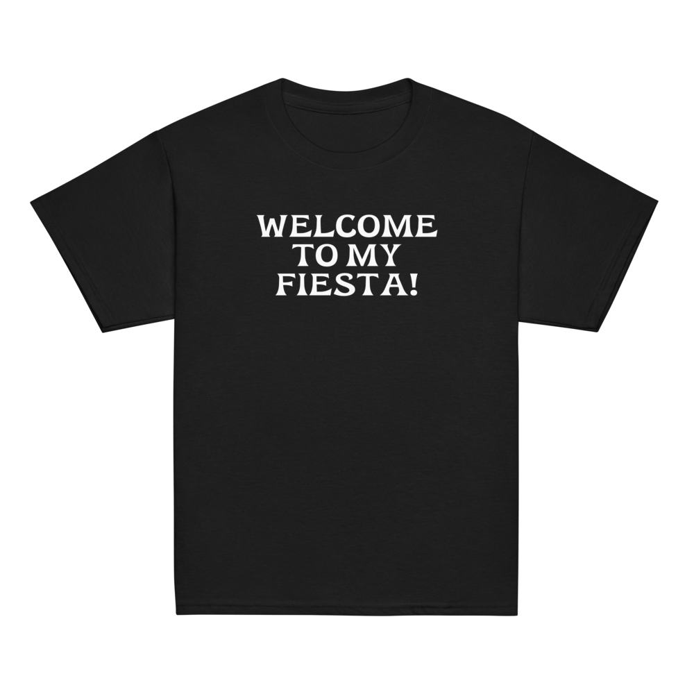 "Welcome to my fiesta!" printed on a black youth classic tee laying on a flat surface