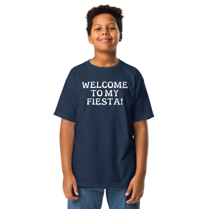 "Welcome to my fiesta!" printed on a navy youth classic tee worn by a male