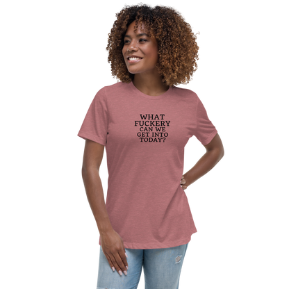 "What fuckery can we get into today?" printed on a heather mauve women's relaxed t-shirt worn by a female