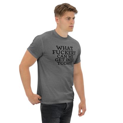 "What fuckery can we get into today?" printed on a graphite heather unisex classic tee worn by a male