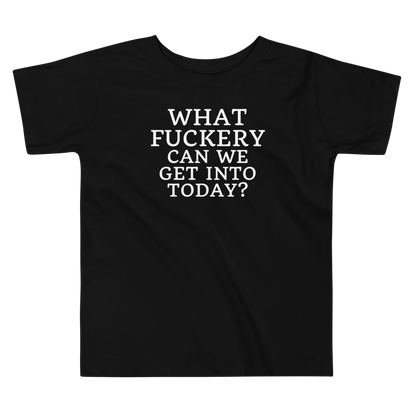 "What fuckery can we get into today?" printed on a black toddler short sleeve tee laying on a flat surface