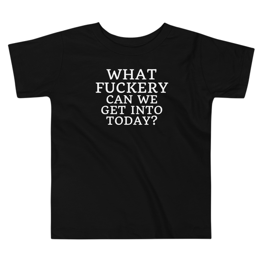 "What fuckery can we get into today?" printed on a black toddler short sleeve tee laying on a flat surface
